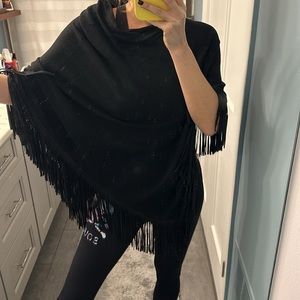 Black poncho with fringe